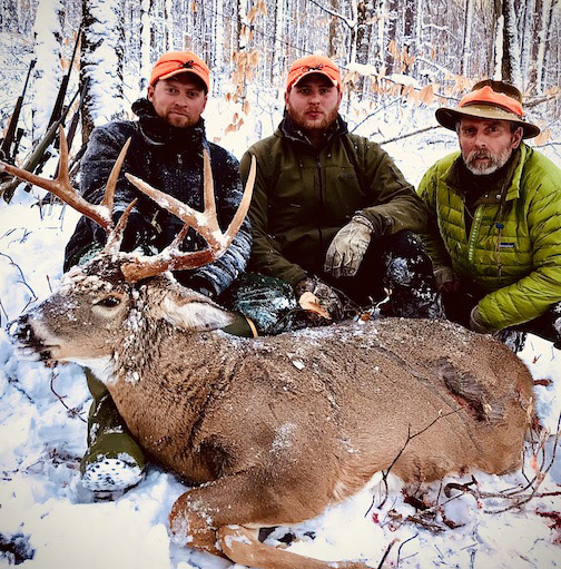 2021: The Frasier crew with a big 205-pound, 8-pointer in Essex County.