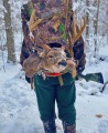 2021: Mike Black, of Long Lake, packs out a heavy horned 10-pointer from the backcountry near Tupper Lake, Dec. 2.