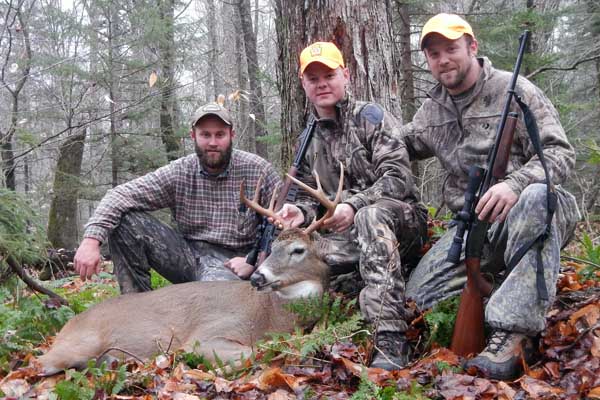 2016: Ethan Johnson, Bill Clark and Chad Johnson with Bill's 150-pound, 8-pointer shot in Hamilton County on Nov. 17 at Camp Witamy hunting club