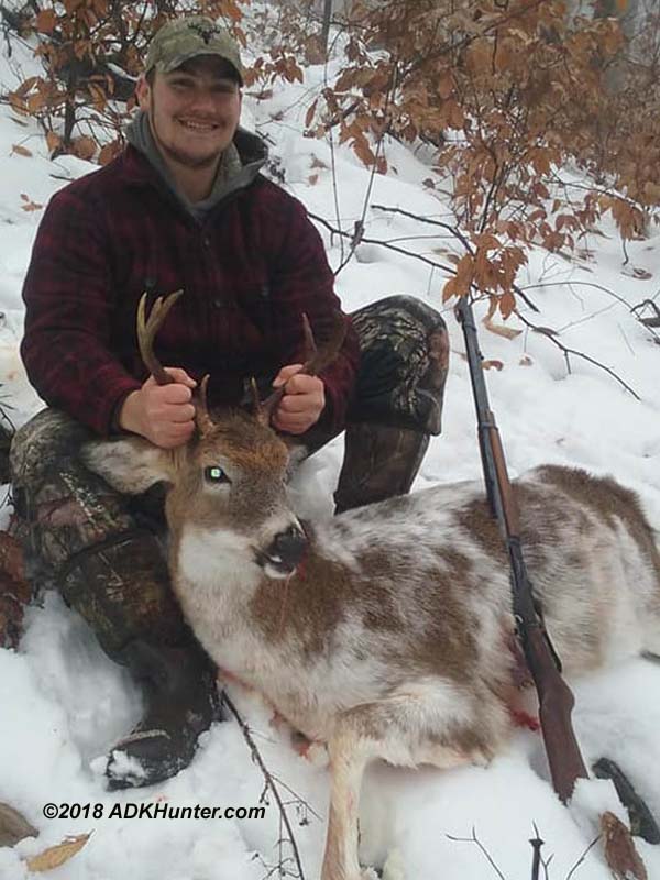 2018: Adam Mitchell, age 18 of Granville, NY with his first Adirondack buck; a piebald 7-pointer that weighed 116-pounds taken Nov. 25 with the Iron Site Gang in Hogtown, NY.