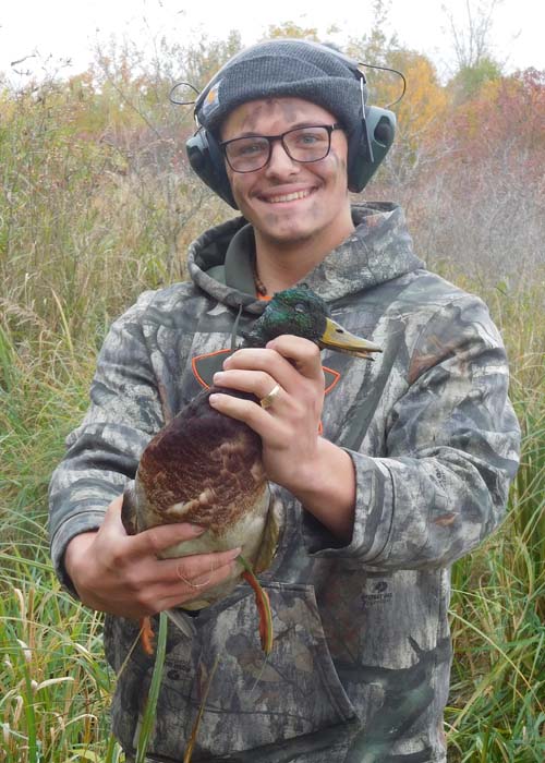 Austin McKittrick of Hartford with his first mallard duck taken Columbus Day on a waterfowl hunt with Basswood Lodge in St. Lawrence County.