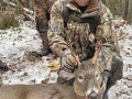 2022: Mike Mahanna of the Tri-Level Lodgewith a 6-pointer  taken in the rain Dec. 3, in Indian Lake.