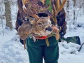 2021: Mike Black, of Long Lake, packs out a heavy horned 10-pointer from the backcountry near Tupper Lake, Dec. 2.