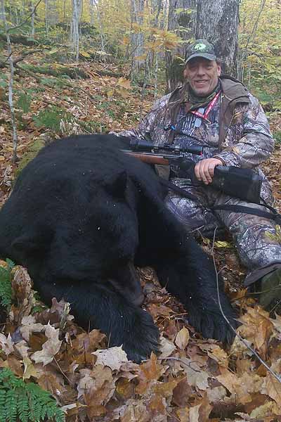 This 425-pound black bear was taken by Wayne Cobler of the Horseshoe Lake Hunging Club near Piercefield in St. Lawrence County. It toos six men six hours to carry the bear a half-mile to a trail where it was later carted out of the woods.