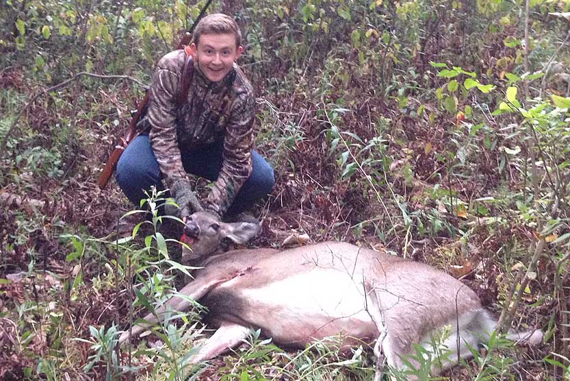 Jack Siple with his first deer, a 125-pound doe yaken with gun during youth hunt, 2016.