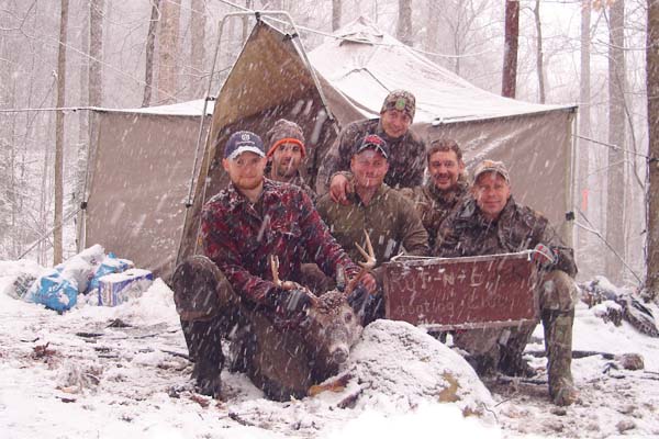 Tim Abrams of the Rut-N-Buck camp with an 8-pointer tan Nov. 26 in Hamilton County