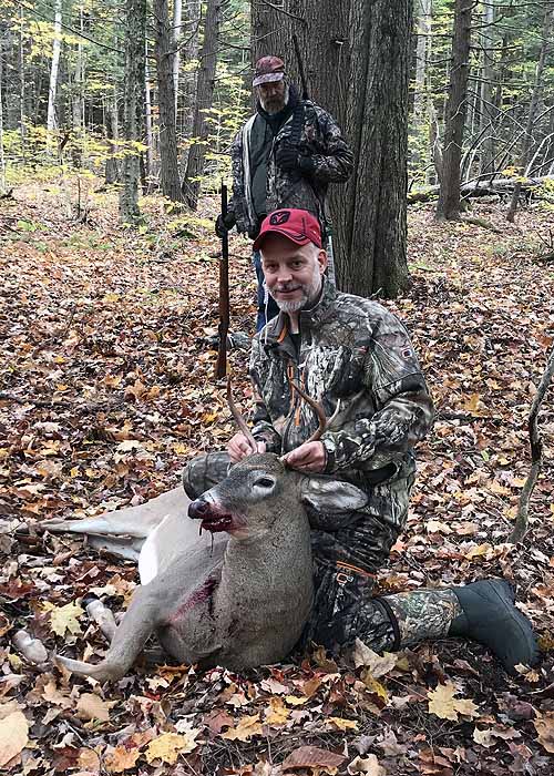 Eric Nitsche with a 125-pound, 5-pointer taken during the early muzzleloading season at the Bird Brook Hunting Club in Lake Luzerne, Warren County.